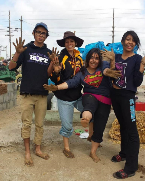 Big smiles with Dr. Sarah Ramirez and fellow volunteers. 