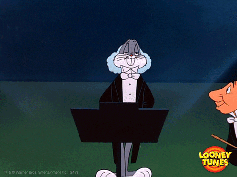 Bugs bunny as an orchestra conductor snapping the conductor baton