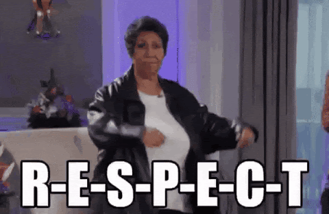 Gif of Aretha Franklin raising her arms triumphantly with the word Respect spelled out in front of her.