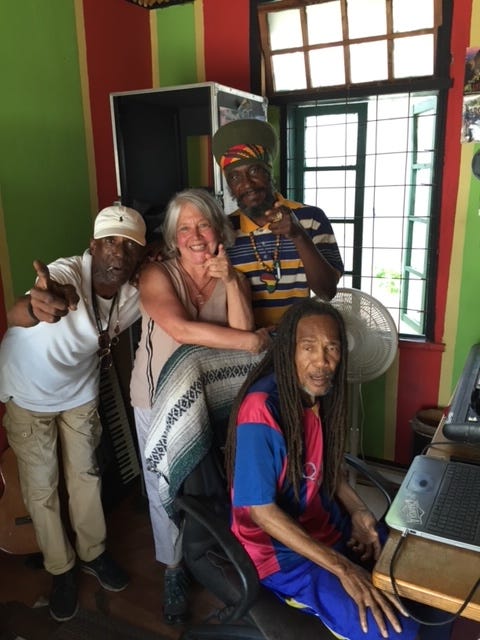 This is me in Trench Town, Kingston, Jamaica with some awesome reggae musicians. Photo credit: Owen Clarke