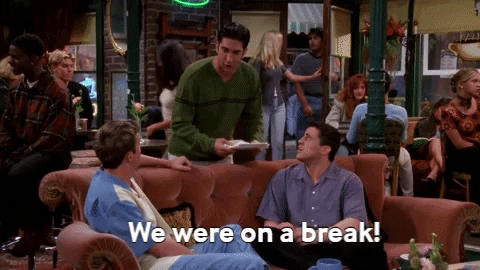 GIF of Friend’s episode where Ross shouts “We were on a break” to Joey and Chandler while in the coffee shop.