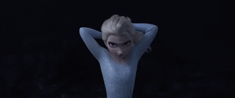 Elsa from “Frozen” tying her hair back, getting ready to face the challenges