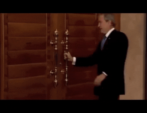 Former President George W. Bush having trouble opening doors.
