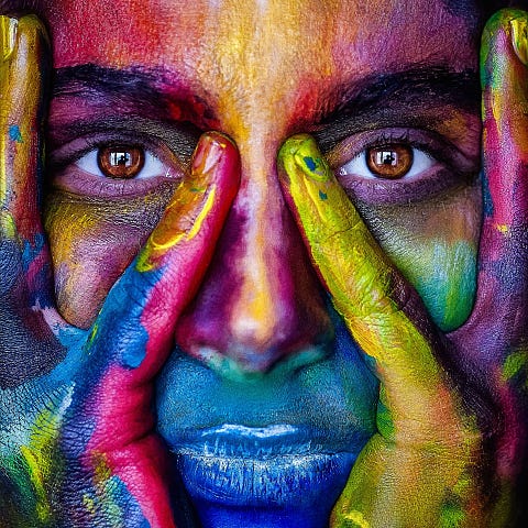 Woman with colorful face paint.