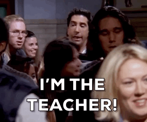 A GIF showing Ross from Friends, with the phrase, “I’m a teacher!”