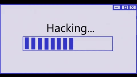 An animated picture showing a loading software bar with the word “hacking” above it and once the software bar completely loads turning to just the word Hacked