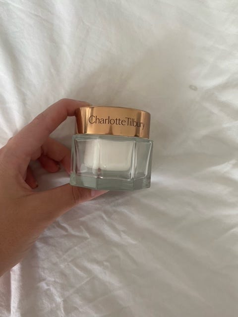 Image of Charlotte Tilbury cream. It has a gold lid