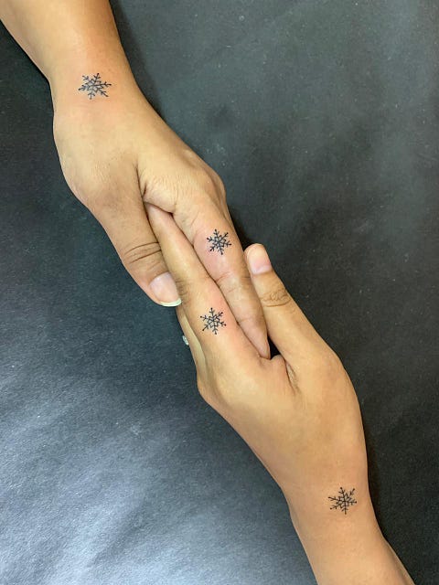 Photo of my sister and me after we got our first tattoo