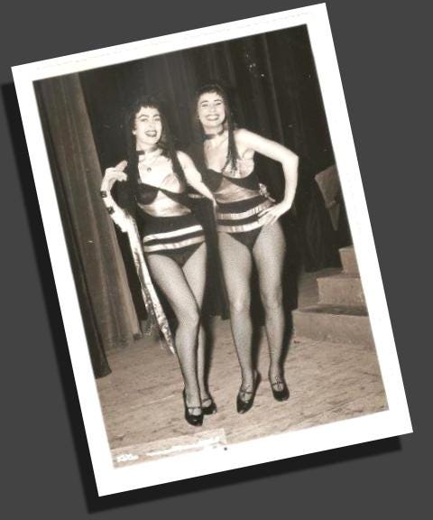 Black and white vintage photo of two cabaret dancers backstage