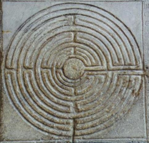 Image of Labyrinth on the portico of the cathedral of San Martino at Lucca, Tuscany, Italy.