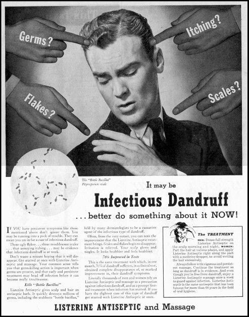 Old Listerine advert showing a man with fingers pointing at him. The headline indicates he has “infectious dandruff”.