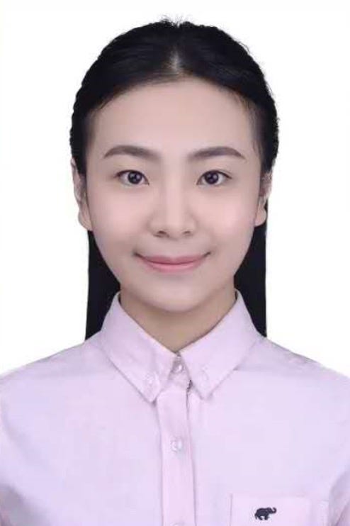 Zhang Chaofan, wearing a pink button-down shirt and facing the camera