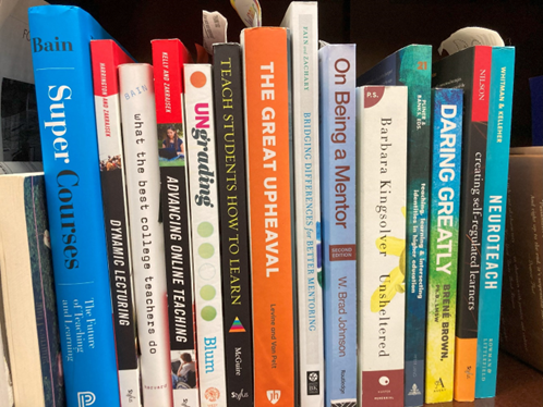 Pedagogy books on a bookshelf