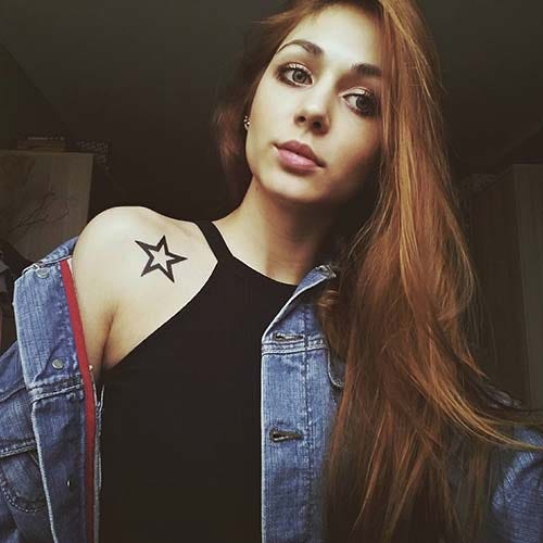 woman shoulder bold star tattoo woman shoulder bold star tattoo