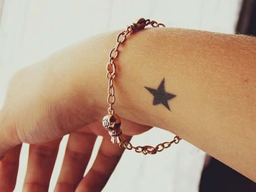 wrist single star tattoo