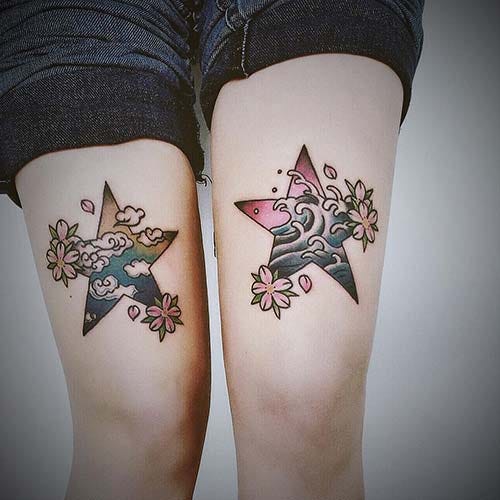 woman leg star tattoo