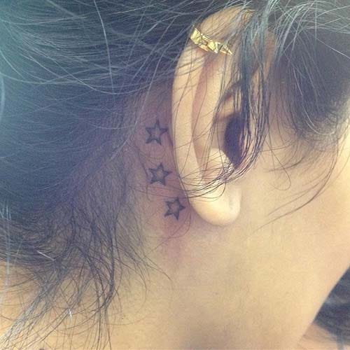 ear back star tattoo