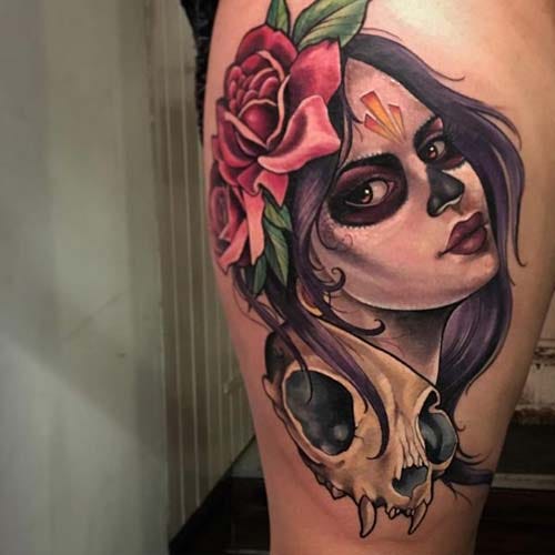 female thigh tattoo