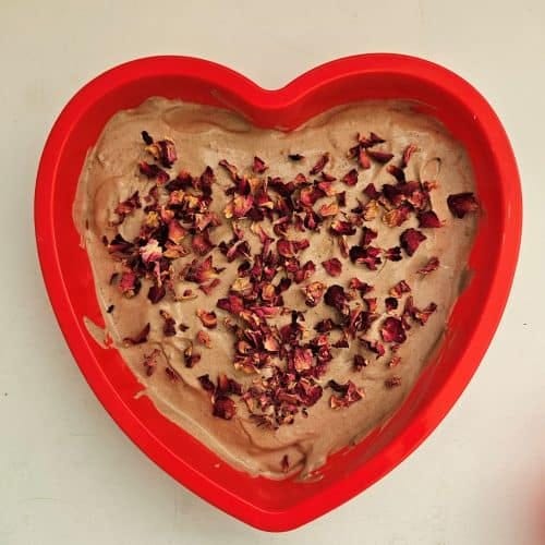 This is a heart-shaped Mocha Cold Brew Tiramisu with Rose Petals in a silicone baking pan