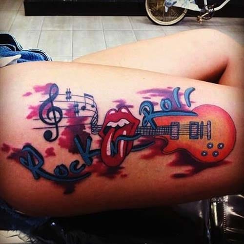 woman rock and roll tattoo