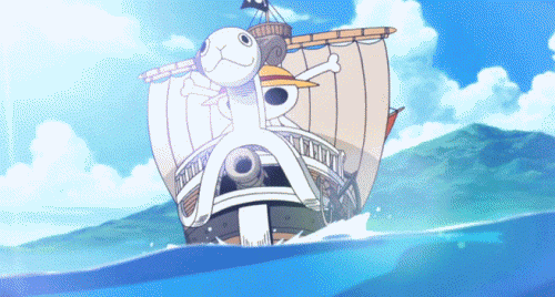 Barco a vela, do tipo caravela, do anime One Piece navegando em alto mar.