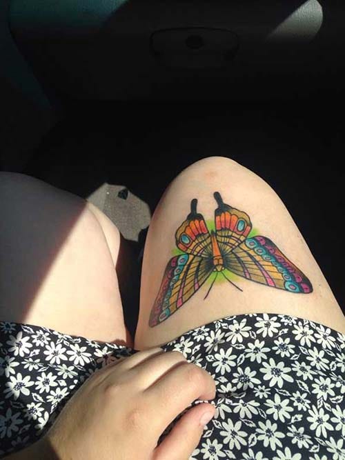 woman upper leg colorful butterfly tattoo woman thigh colorful butetrfly tattoo