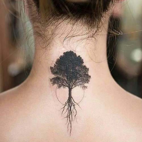 woman back tree tattoo