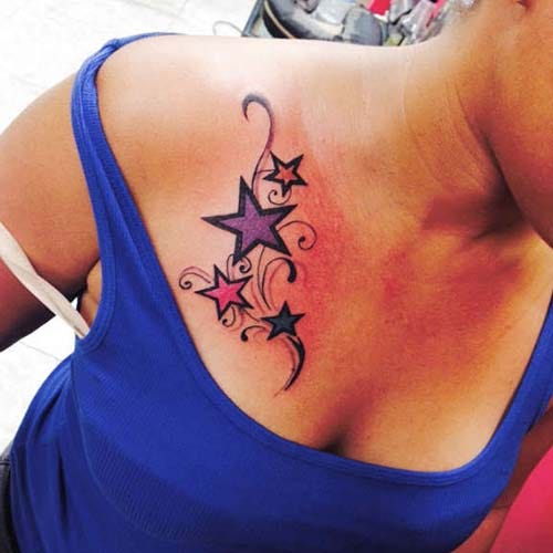 woman chest cute star tattoo