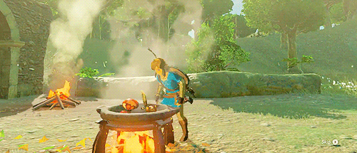 Link qui fait sauter des ingrédients devant une station de cuisine