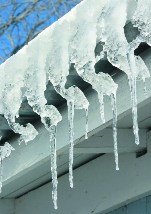 METRO IMAGES Homeowners should check for ice forming near gutters and eaves on a roof. It can cause ice damming, a problem that can lead to damages and leaks.