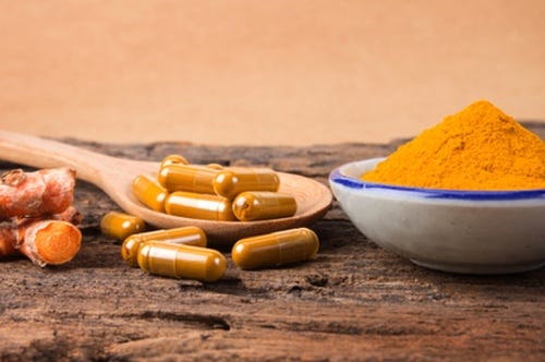 the turmeric powder and capsule and roots curcumin