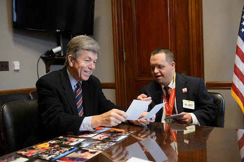 Tanner Hrenchir of Special Olympics  Missouri shares photos of his Special Olympics competitions with Missouri Senator Roy Blunt.