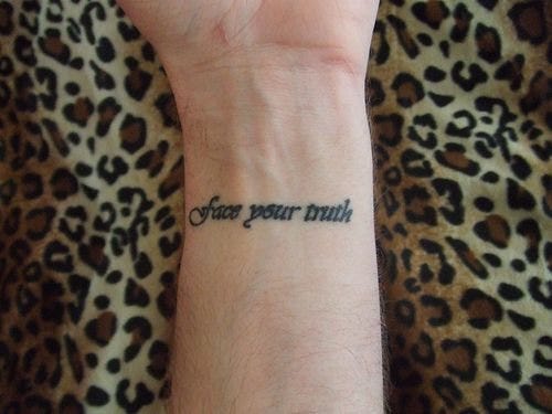 written text tattoo 539