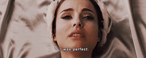 A screenshot from the movie Black Swan. A ballerina is on the brink of death, whispering, “I was perfect.”