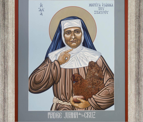 An icon of Madre Juana by Lewis Williams. Juana wears the brown robes, knotted belt, and habit of a Franciscan, with a halo behind her head. She holds a brown hen in the crook of one arm, which symbolizes St. Francis; with her other hand she points towards her throat.