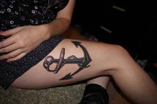 female upper leg anchor tattoo