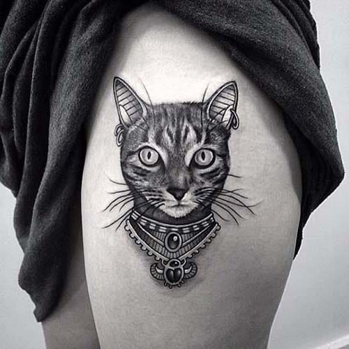 upper leg cat tattoo