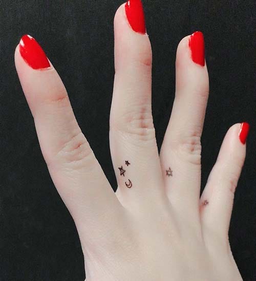 small moon star tattoo on finger small moon star tattoo on finger