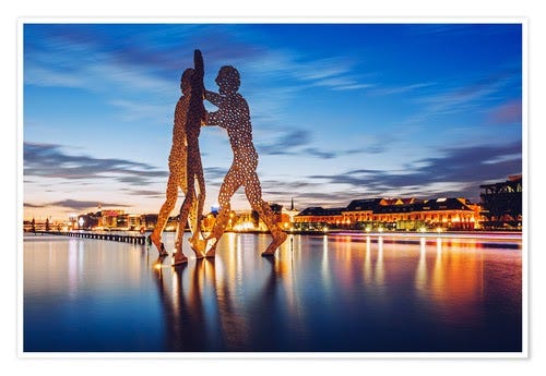 Molecule Man with Sun Reflecting on Water (Germany)