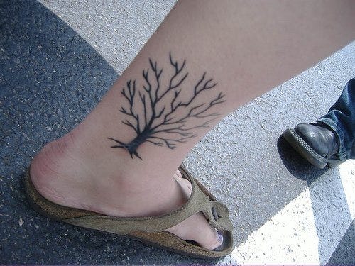 1064 ankle tattoo