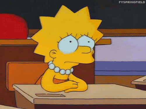 Simpsons cartoon GIF of Lisa looking sad and putting her head on her school desk.