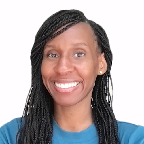 Photo of Whitney-Renē, a Black woman, from the shoulders up. She is looking at the camera with an open-lipped smile. She is wearing stud earrings, and a teal top. Her black hair is in braids brushing both shoulders.