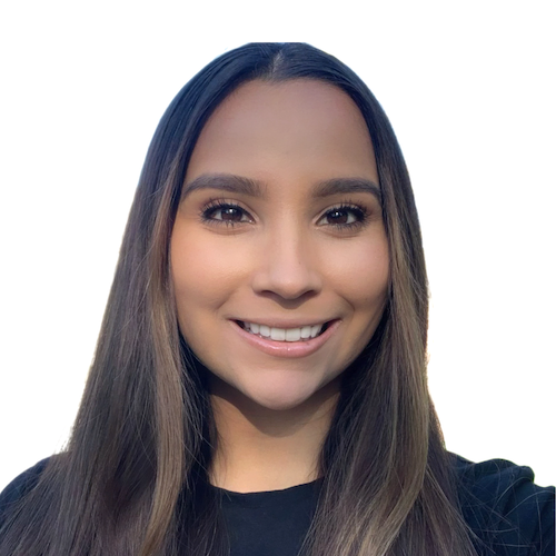 Headshot of Raquel, who is a Mexican-American woman wearing a black blouse and politely smiling at the camera. She has brown hair and the picture background is white.