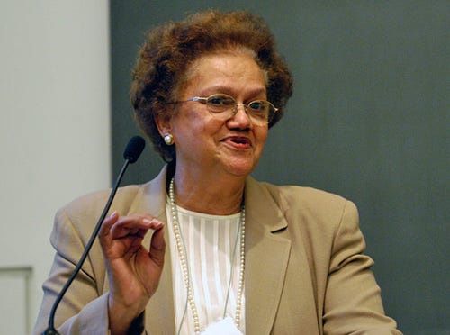 Photo of Shirley McBay speaking at a podium