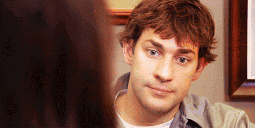 A GIF from ‘The Office’ showing the character Jim Halpert with a surprised and slightly shocked expression on his face.