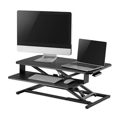 Sit stand desk to prevent back pain.