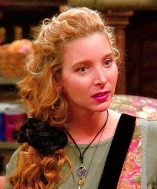 Phoebe Buffay wearing a black scrunchie in a low ponytail.