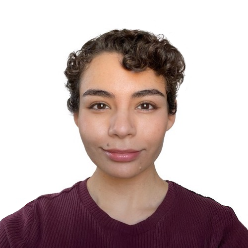 Headshot of Tanya, a Mexican-American person wearing a smile and a burgundy shirt.