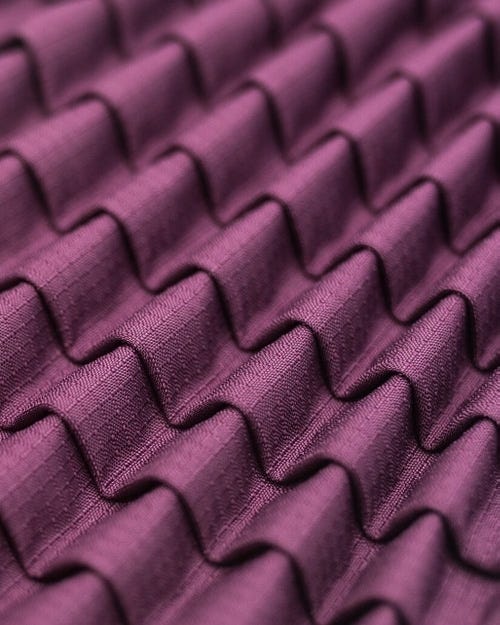 A close-up image of the folded Petit Pli fabric.