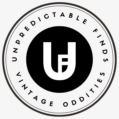 Unpredictable Finds Logo in white letters — U and F combined together againsta a black background. Around the logo it says Unpredictable Finds Vintage Oddities.